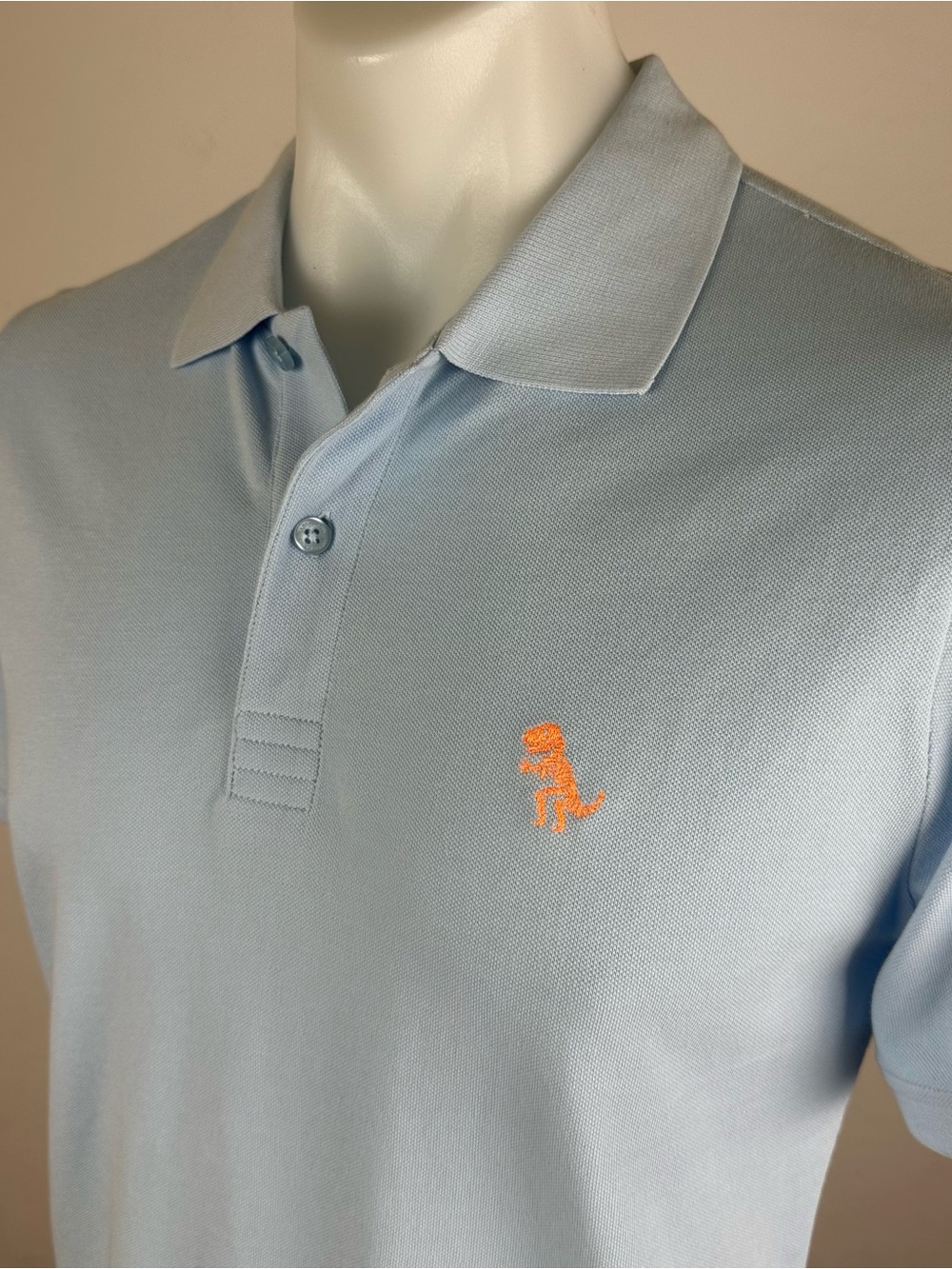 Jared Lang Dinosaur Logo Soft Blue Polo
